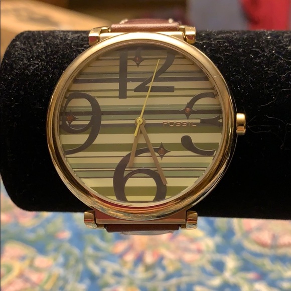 Fossil Accessories - Fossil watch water resistant. Green striped face.